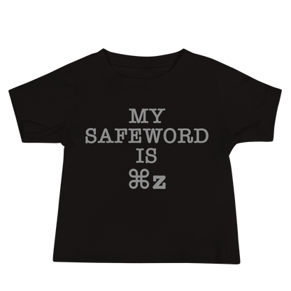 "My Safe Word Is ⌘Z" printed on a black baby jersey short sleeve tee laying on a flat surface