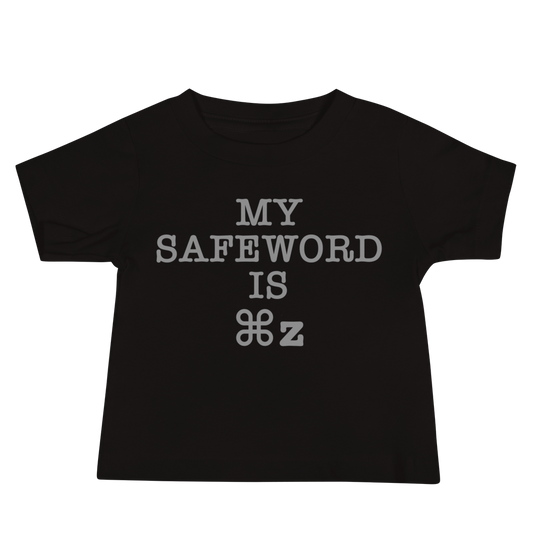 "My Safe Word Is ⌘Z" printed on a black baby jersey short sleeve tee laying on a flat surface