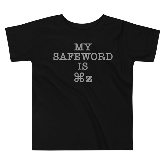 "My Safe Word Is ⌘Z" printed on a black toddler short sleeve tee laying on a flat surface