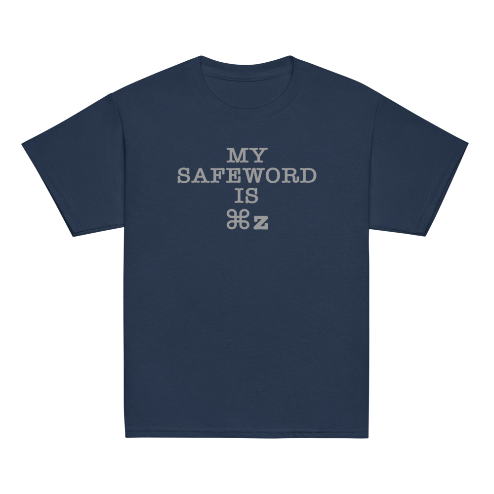 "My Safe Word Is ⌘Z" printed on a navy youth classic tee laying on a flat surface
