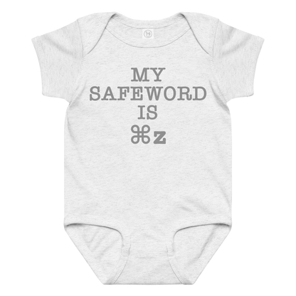 "My Safe Word Is ⌘Z" printed on a ash baby jersey bodysuit laying on a flat surface amongst other clothes