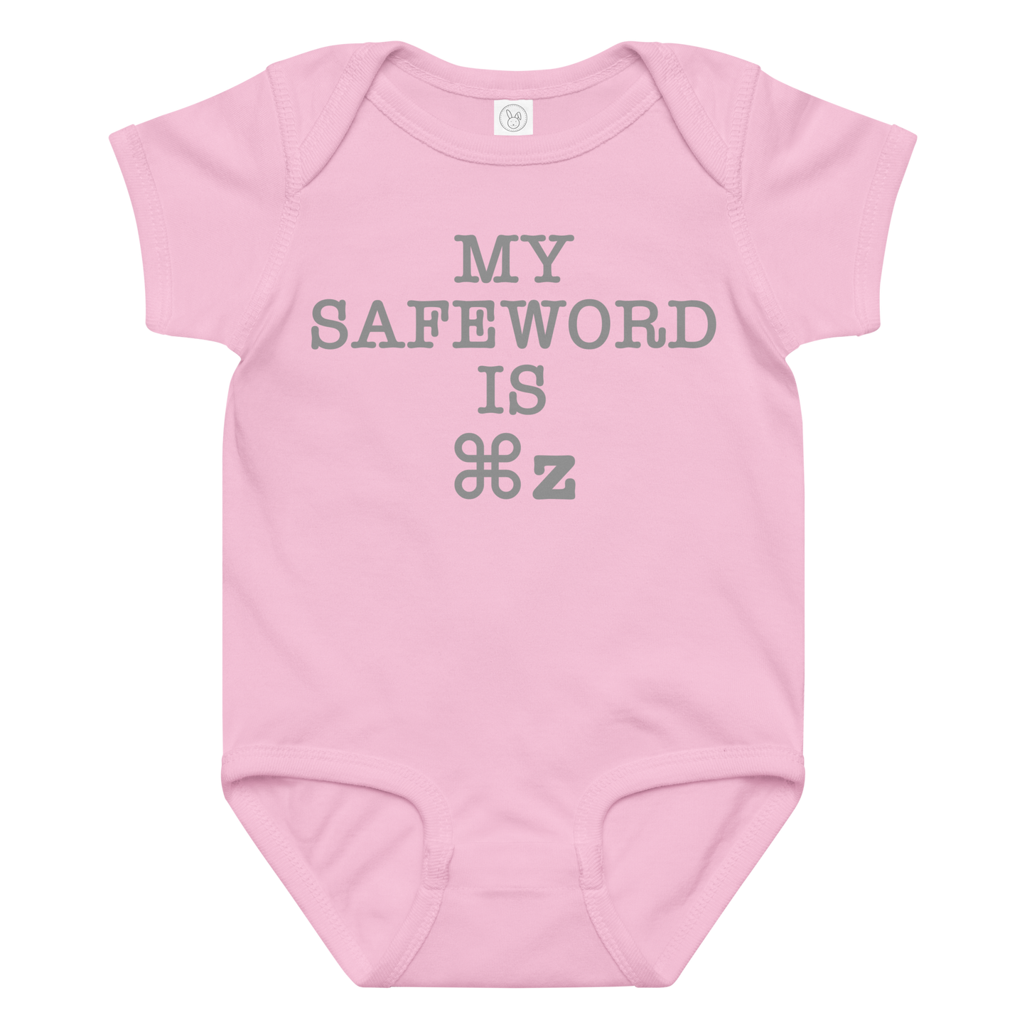 "My Safe Word Is ⌘Z" printed on a pink baby jersey bodysuit laying on a flat surface amongst other clothes