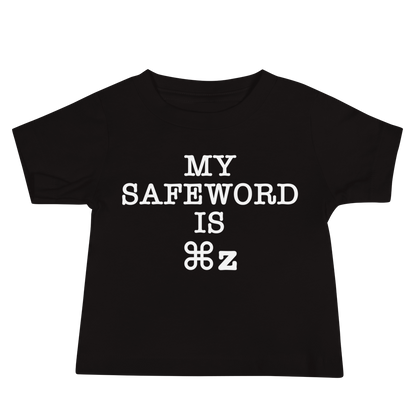 "My Safe Word Is ⌘Z" printed on a black baby jersey short sleeve tee laying on a flat surface