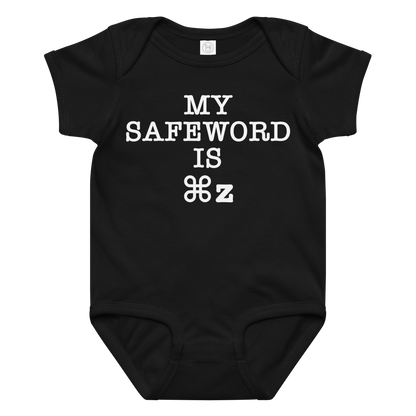 "My Safe Word Is ⌘Z" printed on a black baby jersey bodysuit laying on a flat surface amongst other clothes