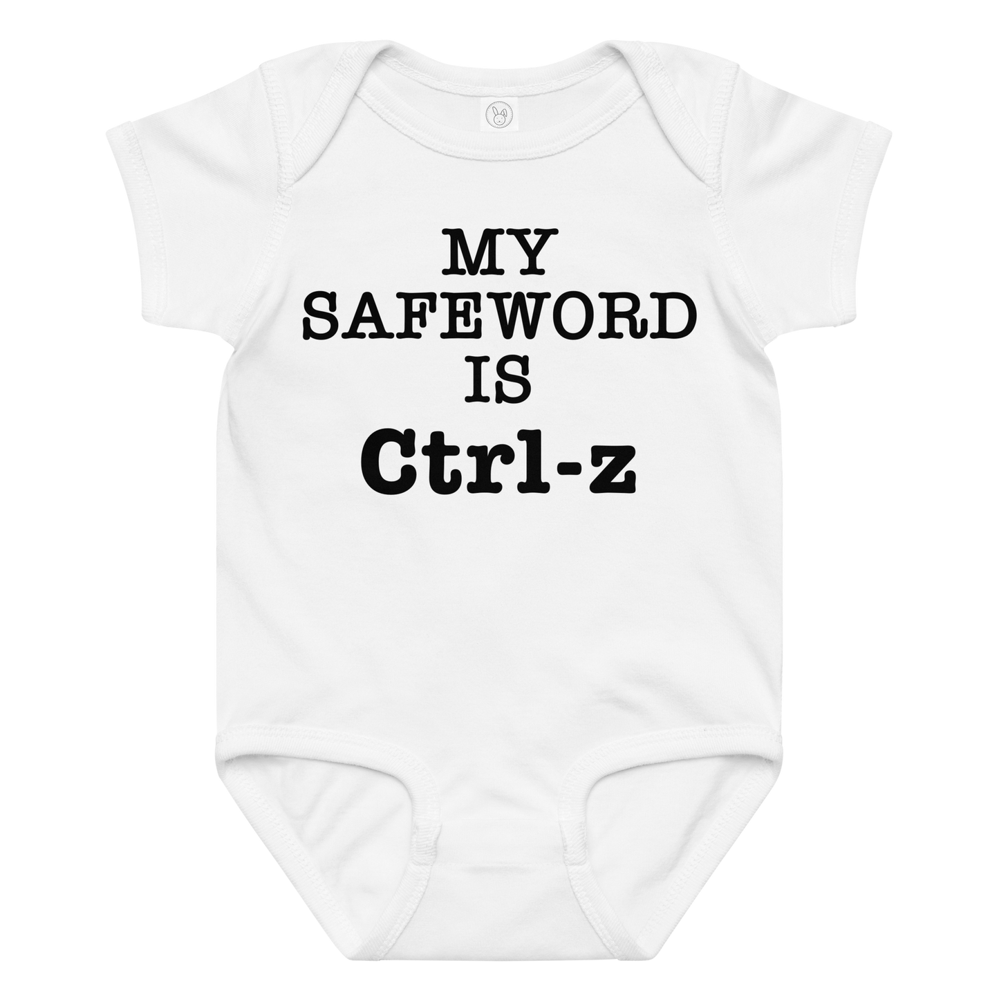 "My Safe Word Is Ctrl-Z" printed on a white baby jersey bodysuit laying on a flat surface amongst other clothes