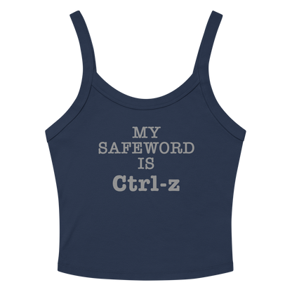 "My Safe Word Is Ctrl-Z" printed on a solid navy blend women's micro-rib tanktop laying on a flat surface amongst sunglasses and shorts