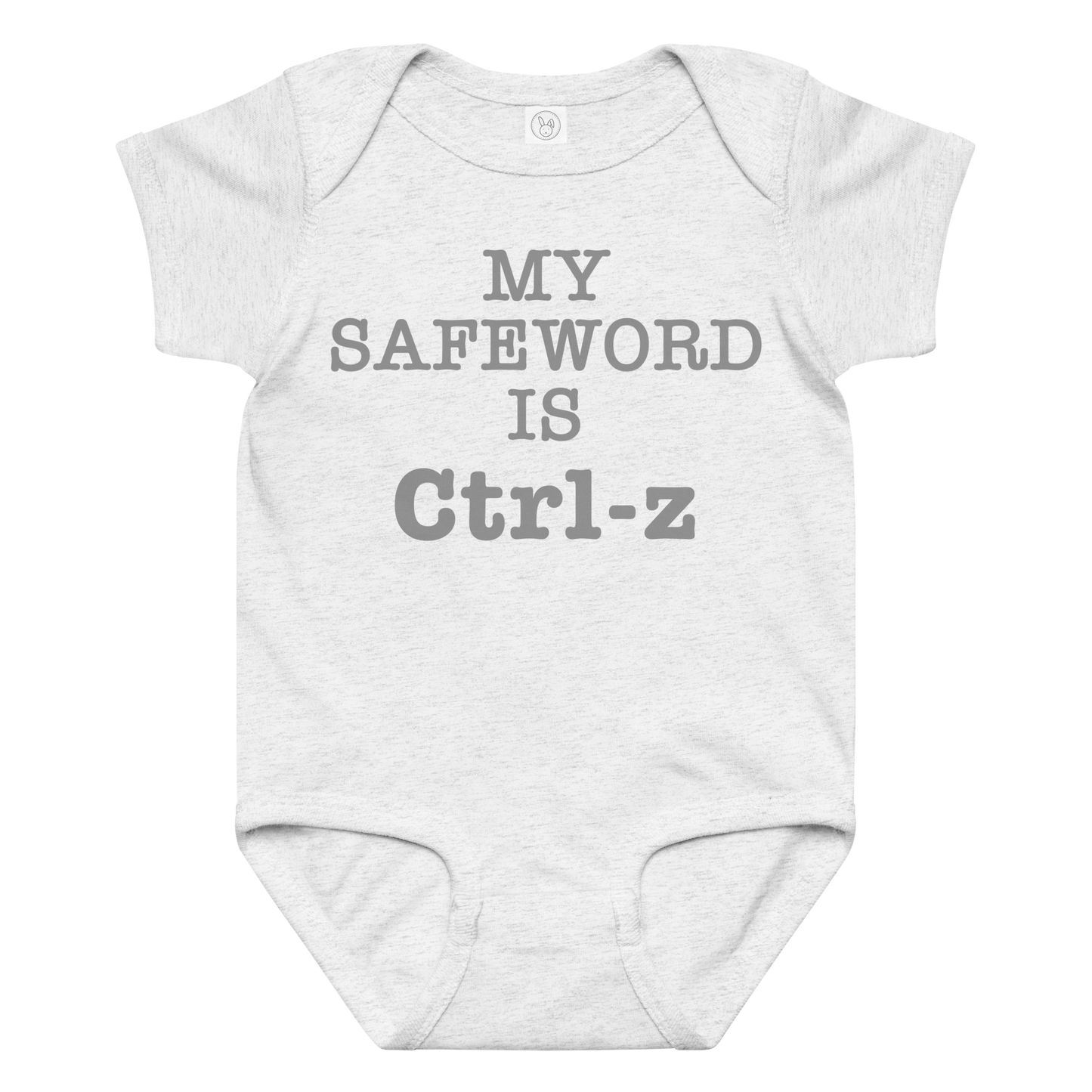 "My Safe Word Is Ctrl-Z" printed on a ash baby jersey bodysuit laying on a flat surface amongst other clothes