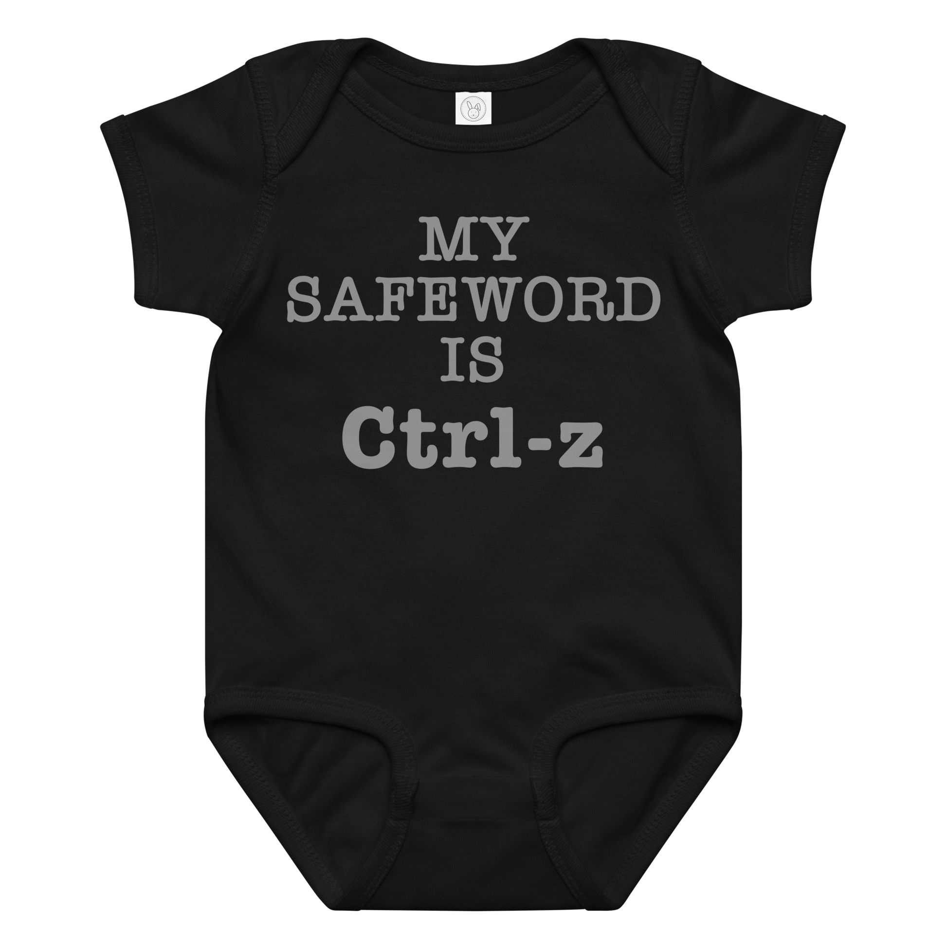 "My Safe Word Is Ctrl-Z" printed on a black baby jersey bodysuit laying on a flat surface amongst other clothes