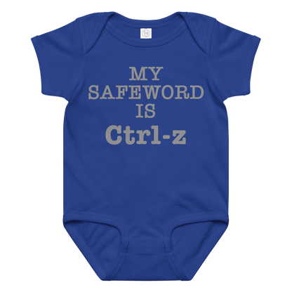 "My Safe Word Is Ctrl-Z" printed on a royal baby jersey bodysuit laying on a flat surface amongst other clothes