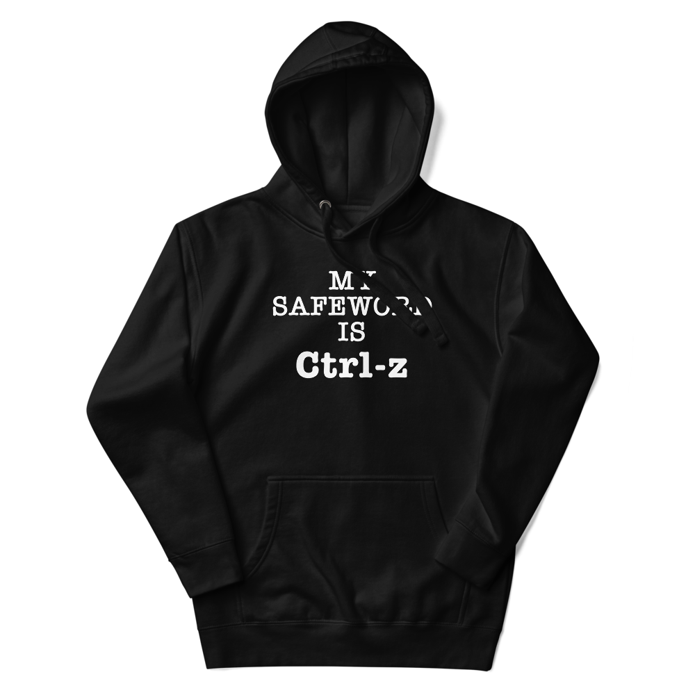 "My Safe Word Is Ctrl-Z" printed on a black unisex hoodie laying on a flat surface with the hood up