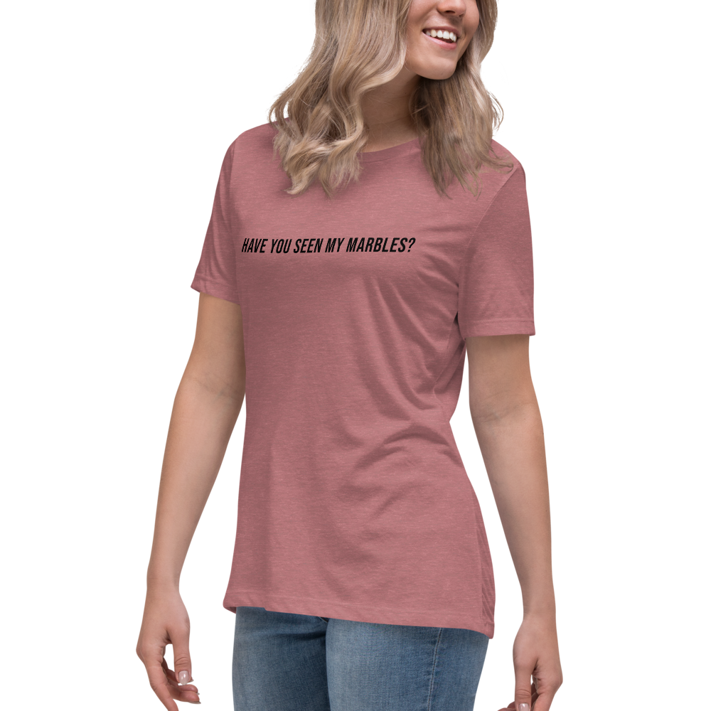 "Have you seen my marbles?" printed on a heather mauve women's relaxed t-shirt worn by a female