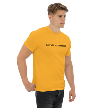"Have you seen my marbles?" printed on a gold unisex classic tee worn by a male