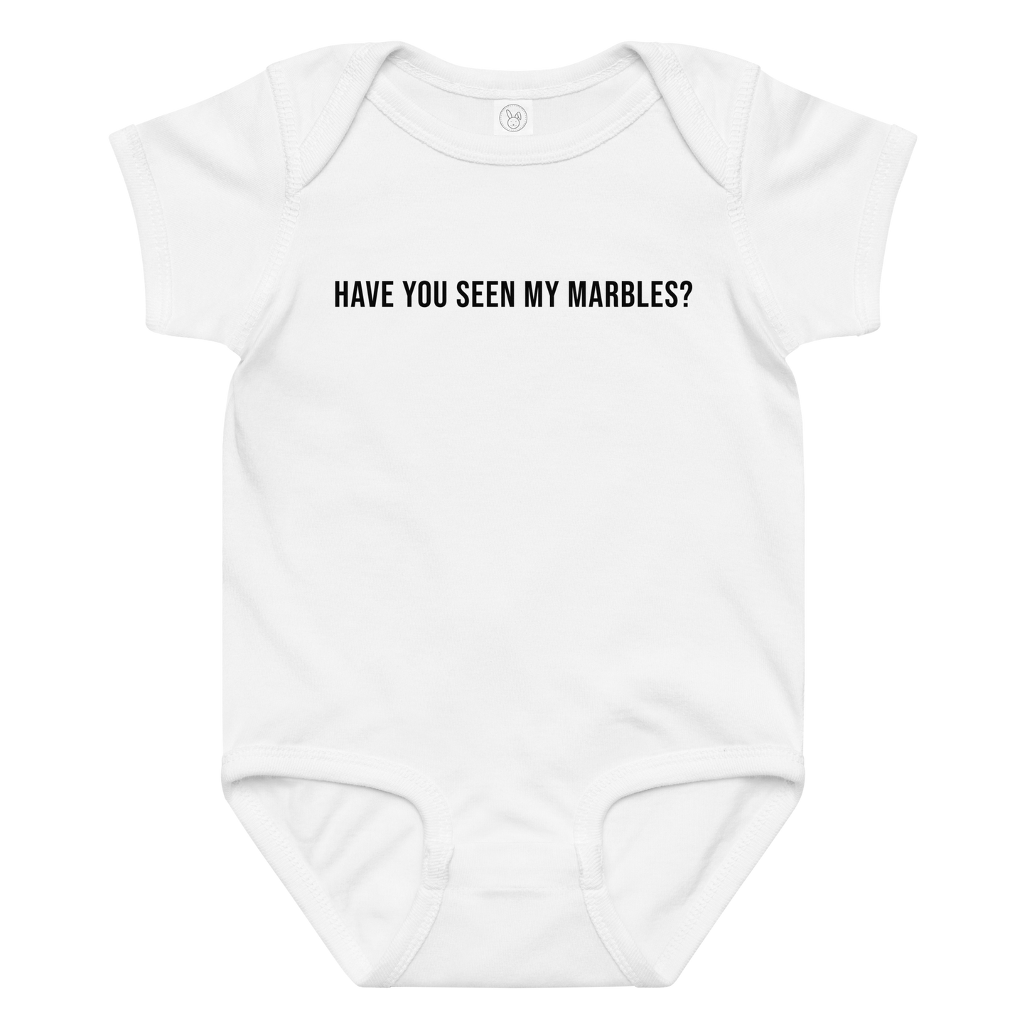 "Have you seen my marbles?" printed on a white baby jersey bodysuit laying on a flat surface amongst other clothes