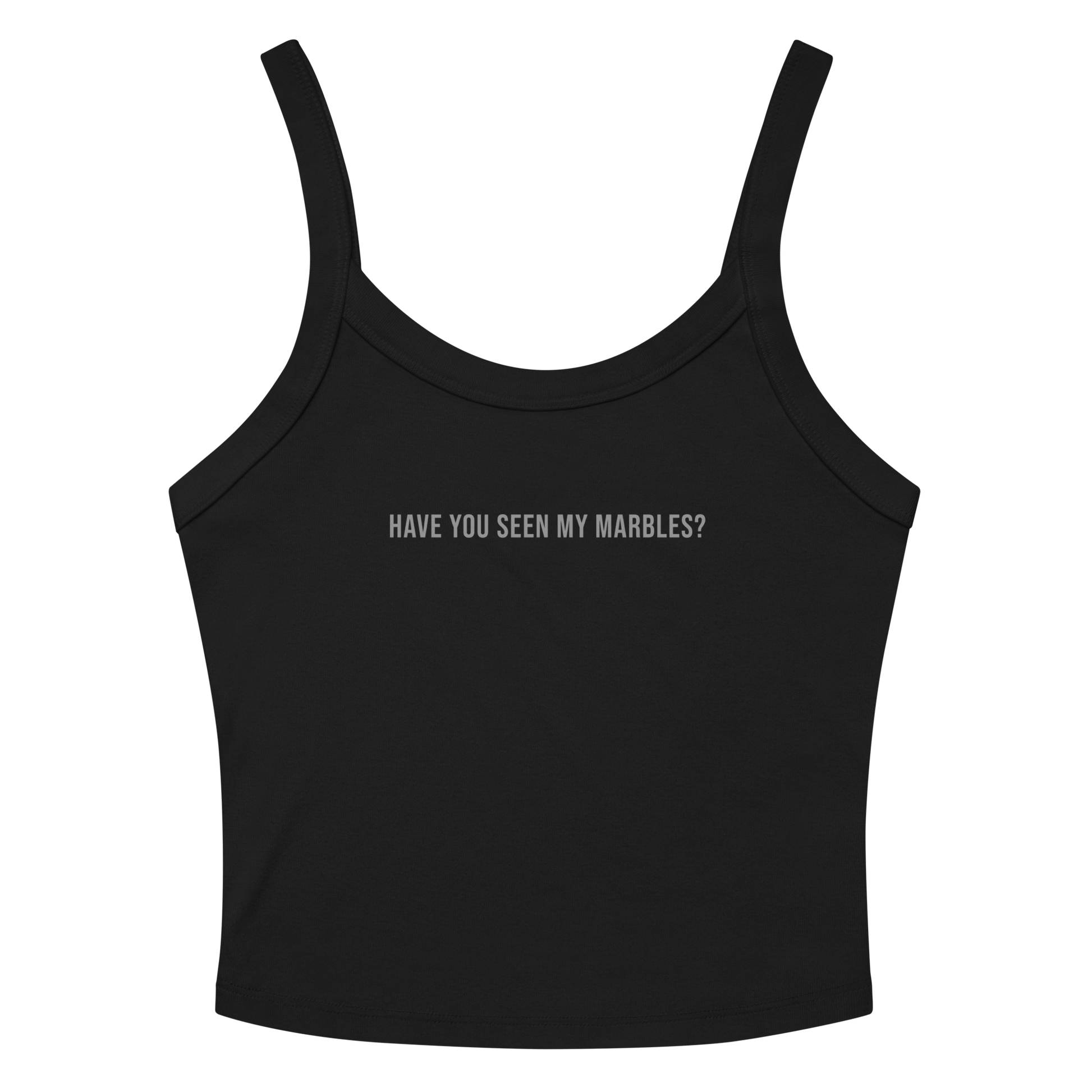 "Have you seen my marbles?" printed on a solid black blend women's micro-rib tanktop laying on a flat surface amongst sunglasses and shorts
