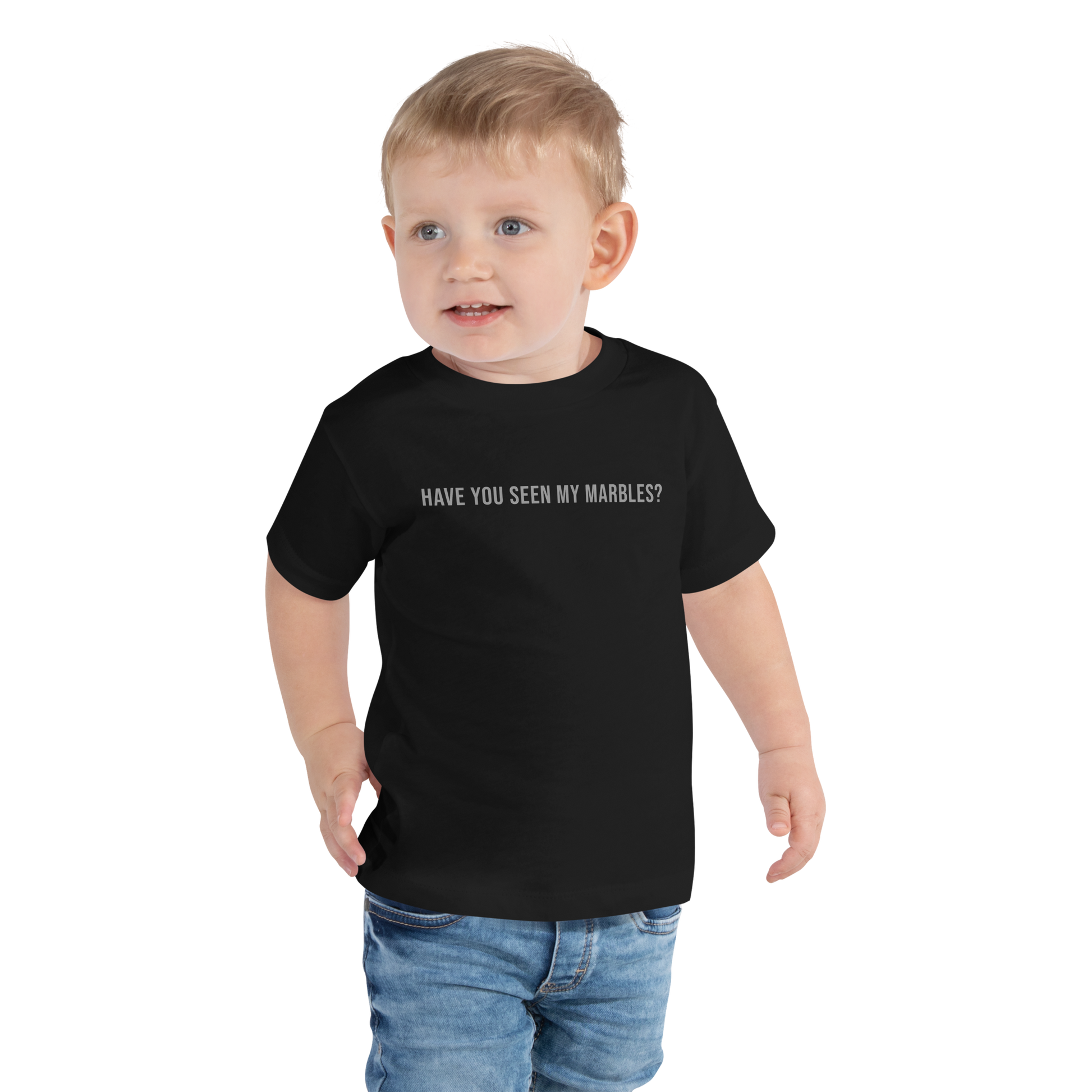 "Have you seen my marbles?" printed on a black toddler short sleeve tee worn by a male