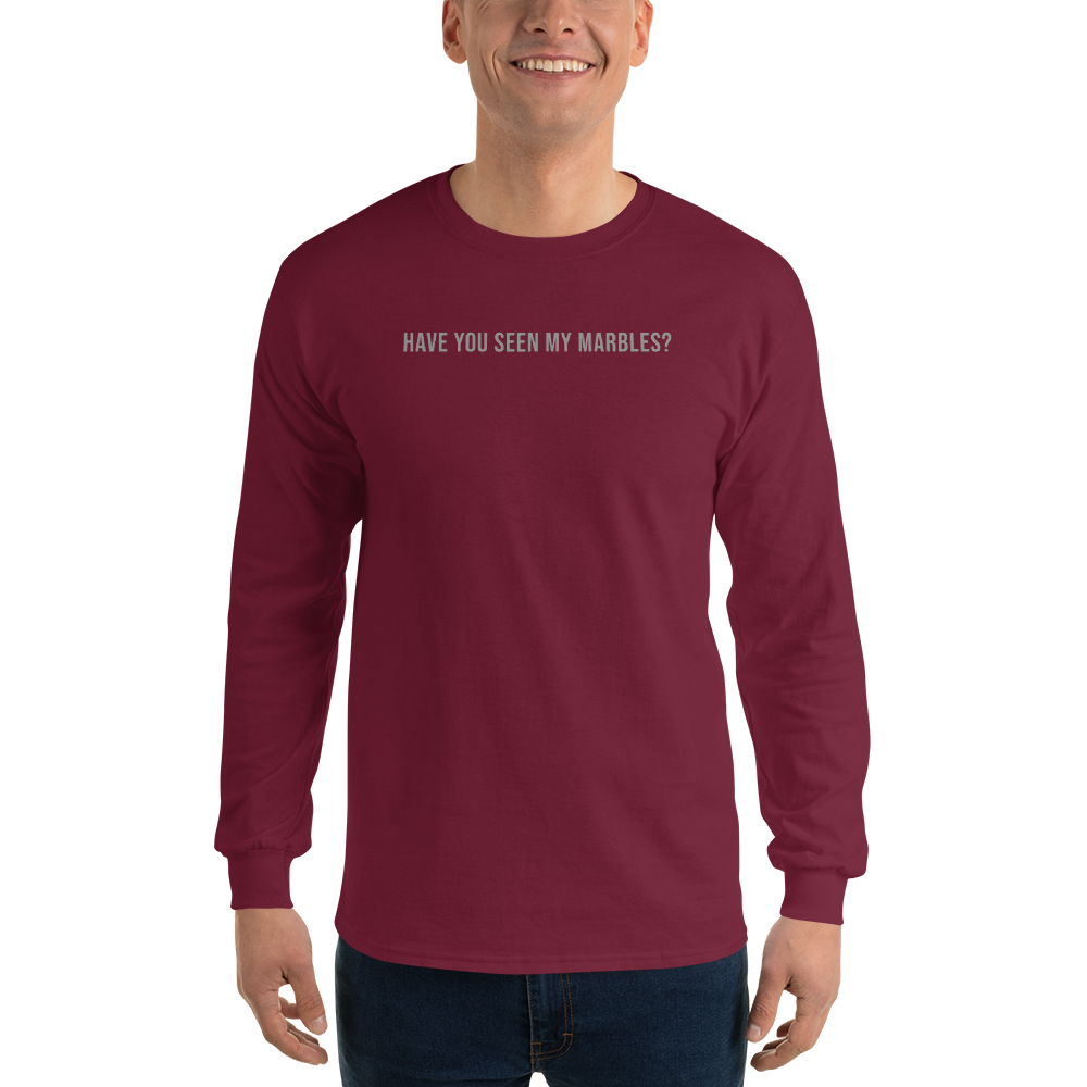 "Have you seen my marbles?" printed on a maroon men's long sleeve shirt worn by a male