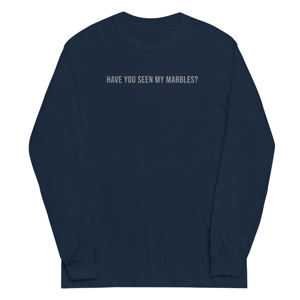 "Have you seen my marbles?" printed on a navy men's long sleeve shirt laying on a flat surface