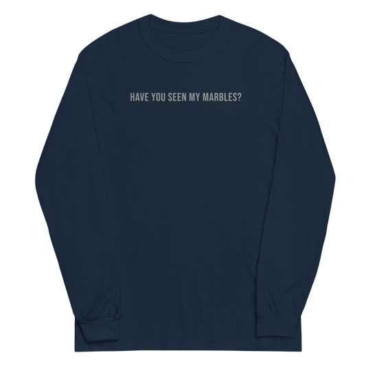 "Have you seen my marbles?" printed on a navy men's long sleeve shirt laying on a flat surface