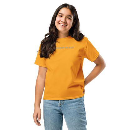 "Have you seen my marbles?" printed on a gold youth classic tee worn by a female