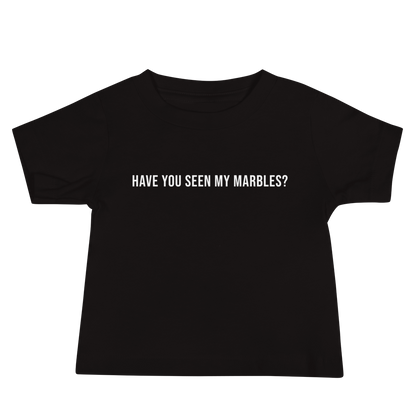 "Have you seen my marbles?" printed on a black baby jersey short sleeve tee laying on a flat surface