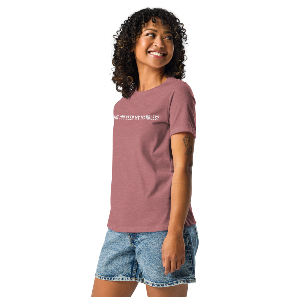 "Have you seen my marbles?" printed on a heather mauve women's relaxed t-shirt worn by a female