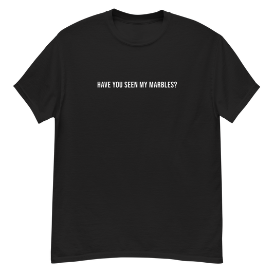 "Have you seen my marbles?" printed on a black unisex classic tee laying on a flat surface