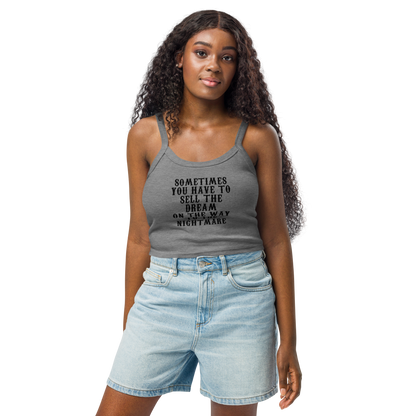"Sometimes you have to sell the dream on the way to the nightmare" printed on a athletic heather women's micro-rib tanktop worn by a female