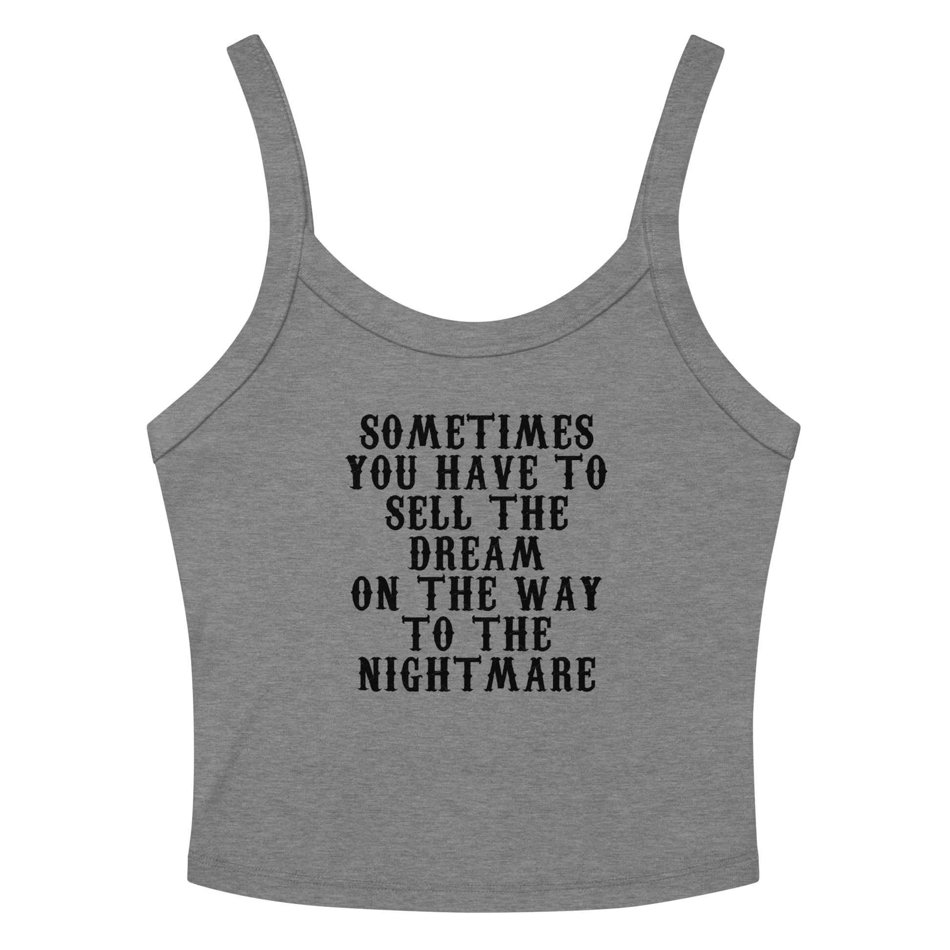 "Sometimes you have to sell the dream on the way to the nightmare" printed on a athletic heather women's micro-rib tanktop laying on a flat surface amongst sunglasses and shorts