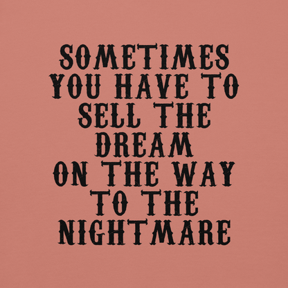 "Sometimes you have to sell the dream on the way to the nightmare" printed on a dusty rose background