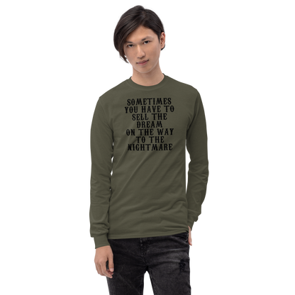 "Sometimes you have to sell the dream on the way to the nightmare" printed on a military green men's long sleeve shirt worn by a male