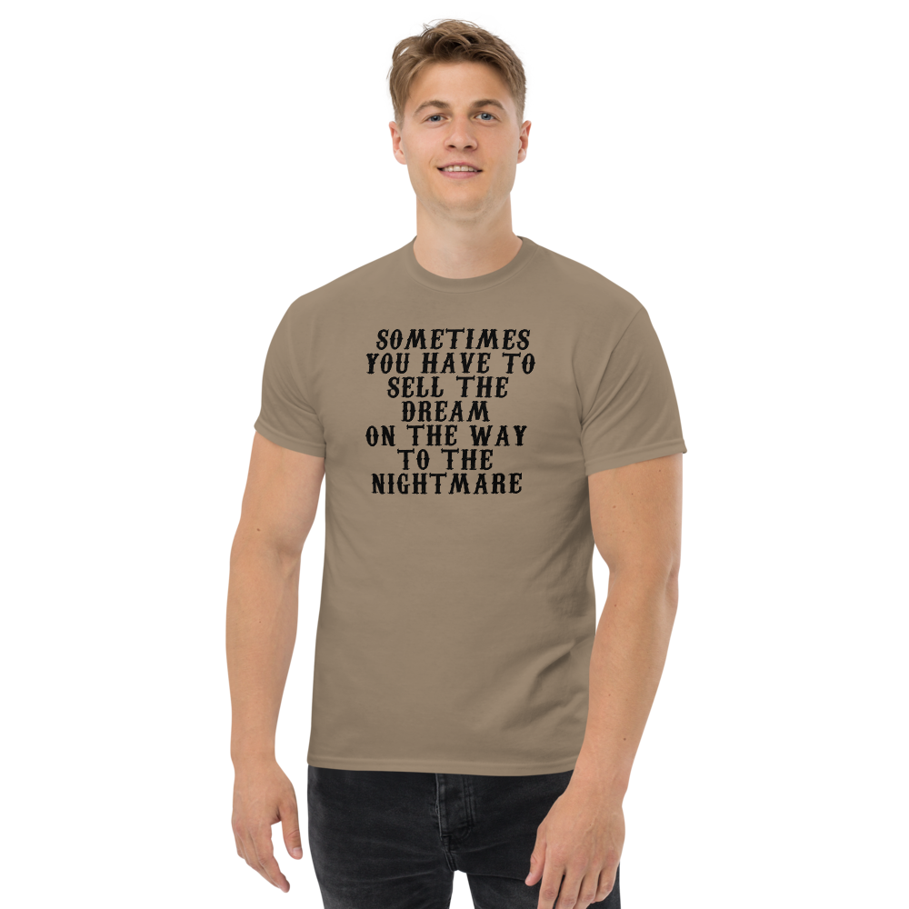 "Sometimes you have to sell the dream on the way to the nightmare" printed on a brown savana unisex classic tee worn by a male