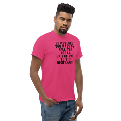 "Sometimes you have to sell the dream on the way to the nightmare" printed on a heliconia unisex classic tee worn by a male