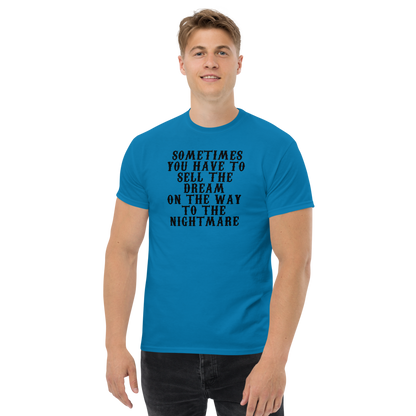 "Sometimes you have to sell the dream on the way to the nightmare" printed on a sapphire unisex classic tee worn by a male