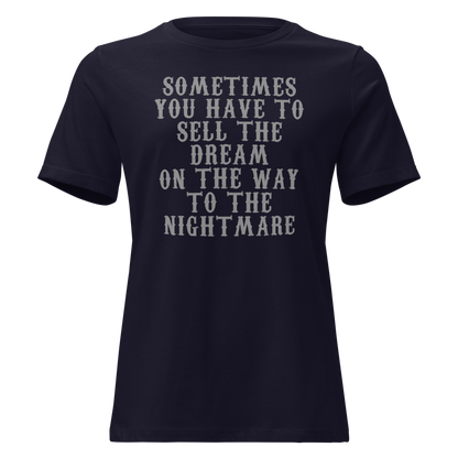 "Sometimes you have to sell the dream on the way to the nightmare" printed on a navy on an invisible / simulated body
