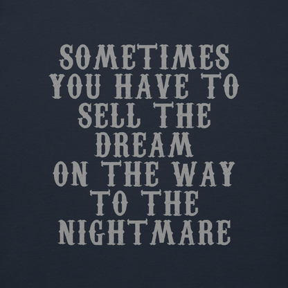 "Sometimes you have to sell the dream on the way to the nightmare" printed on a navy blazer background