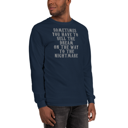 "Sometimes you have to sell the dream on the way to the nightmare" printed on a navy men's long sleeve shirt worn by a male