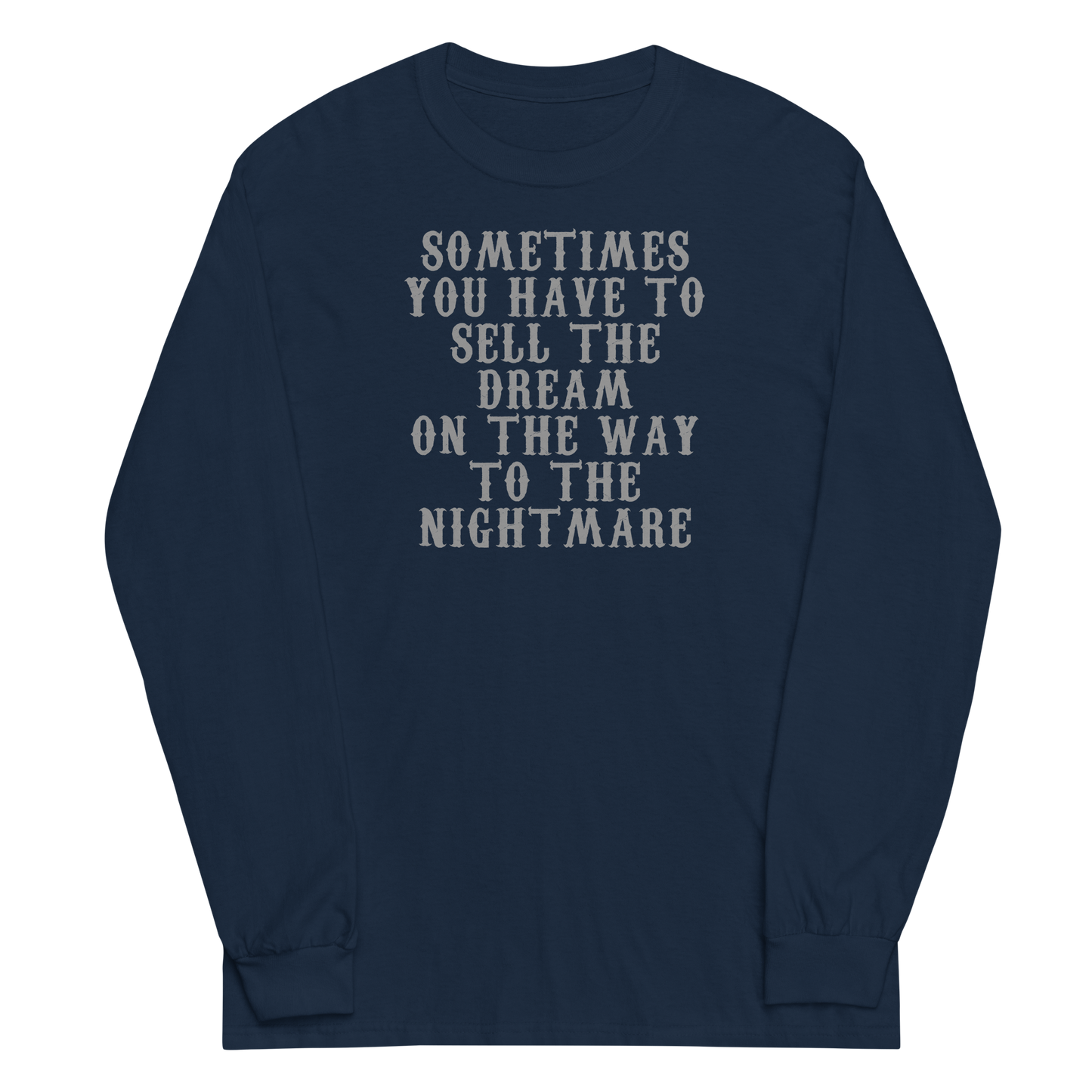 "Sometimes you have to sell the dream on the way to the nightmare" printed on a navy men's long sleeve shirt laying on a flat surface