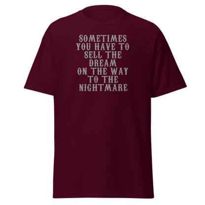 "Sometimes you have to sell the dream on the way to the nightmare" printed on a maroon on an invisible body