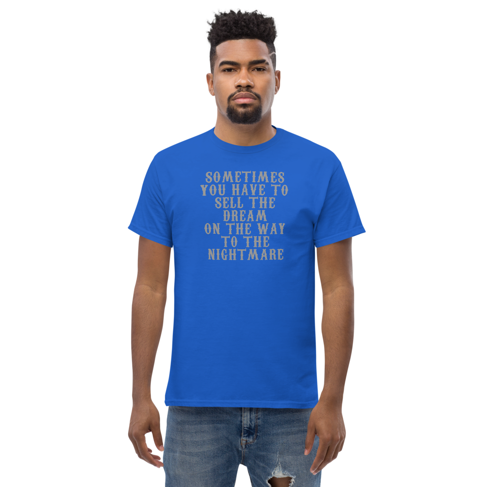 "Sometimes you have to sell the dream on the way to the nightmare" printed on a royal unisex classic tee worn by a male