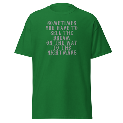 "Sometimes you have to sell the dream on the way to the nightmare" printed on a turf green on an invisible body