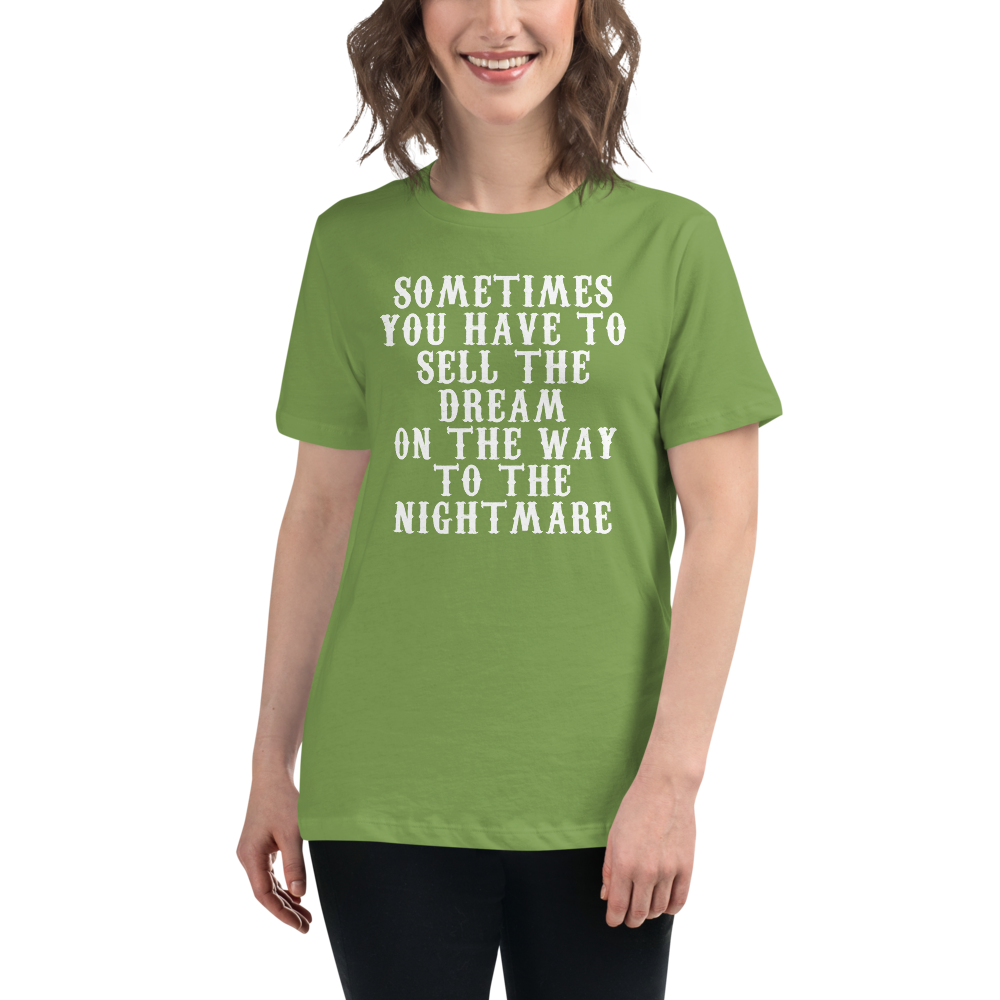 "Sometimes you have to sell the dream on the way to the nightmare" printed on a leaf women's relaxed t-shirt worn by a female