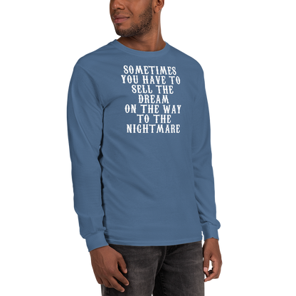 "Sometimes you have to sell the dream on the way to the nightmare" printed on a indigo blue men's long sleeve shirt worn by a male