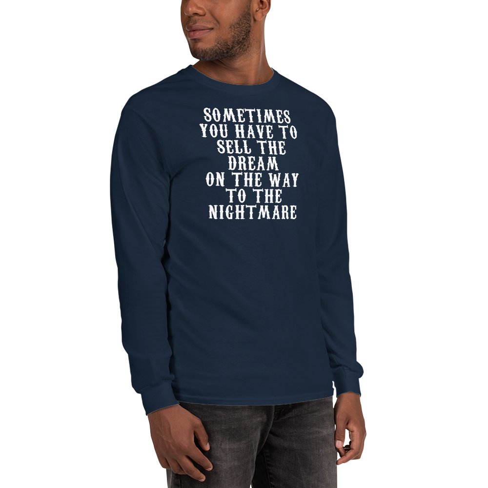 "Sometimes you have to sell the dream on the way to the nightmare" printed on a navy men's long sleeve shirt worn by a male