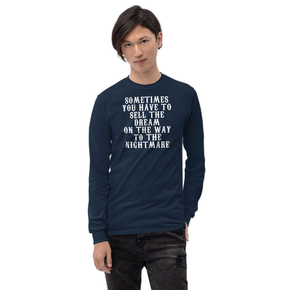 "Sometimes you have to sell the dream on the way to the nightmare" printed on a navy men's long sleeve shirt worn by a male