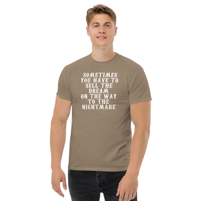 "Sometimes you have to sell the dream on the way to the nightmare" printed on a brown savana unisex classic tee worn by a male