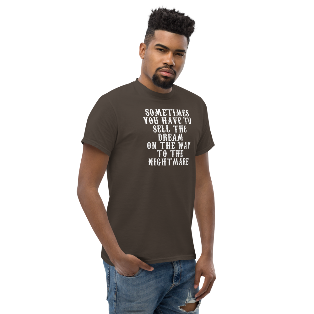 "Sometimes you have to sell the dream on the way to the nightmare" printed on a dark chocolate unisex classic tee worn by a male