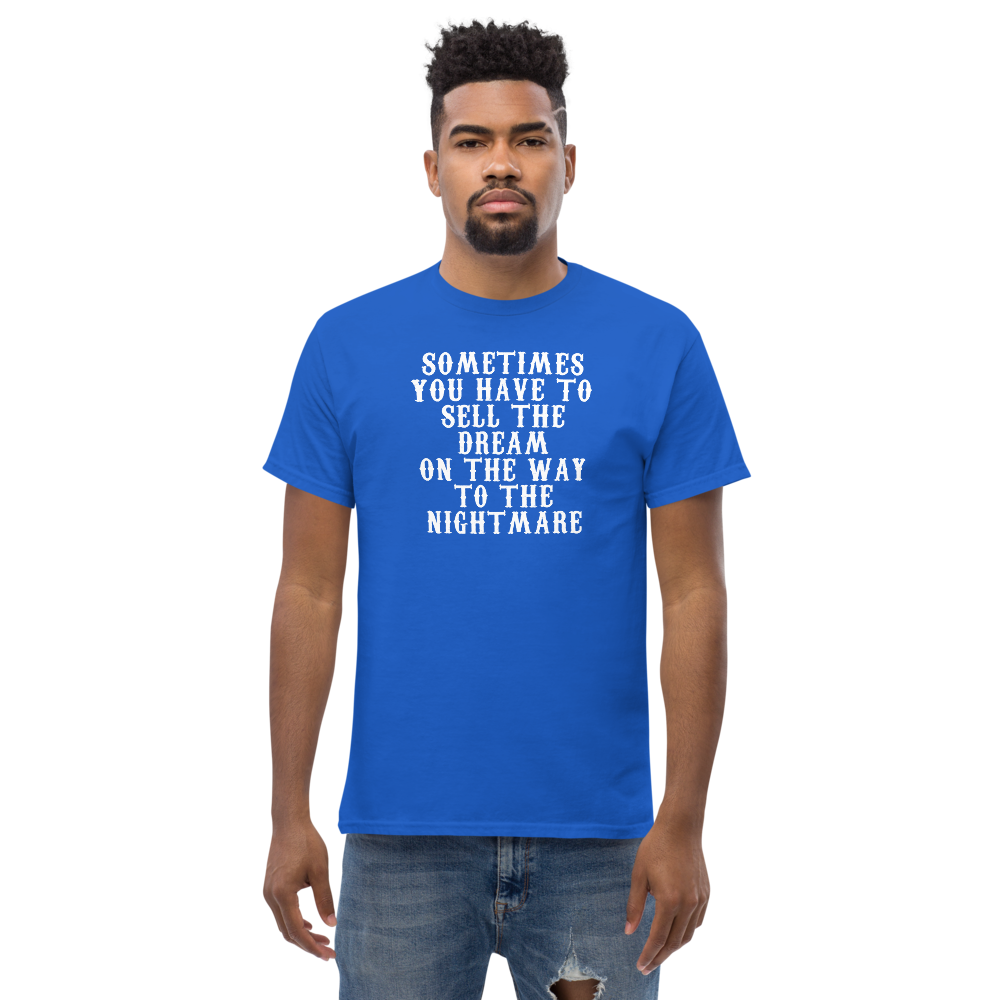 "Sometimes you have to sell the dream on the way to the nightmare" printed on a royal unisex classic tee worn by a male
