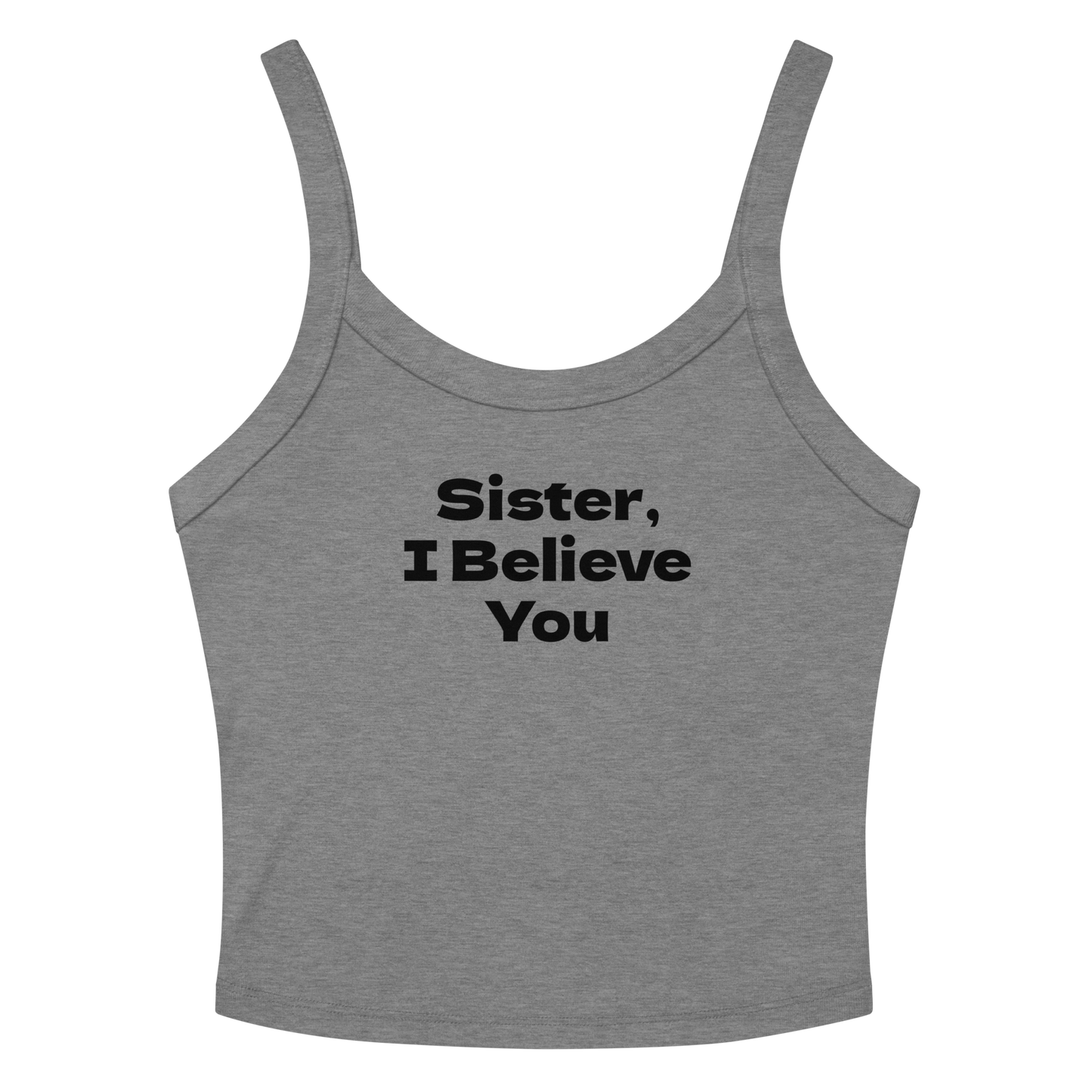 "Sister, I Believe You!" printed on a athletic heather women's micro-rib tanktop laying on a flat surface amongst sunglasses and shorts