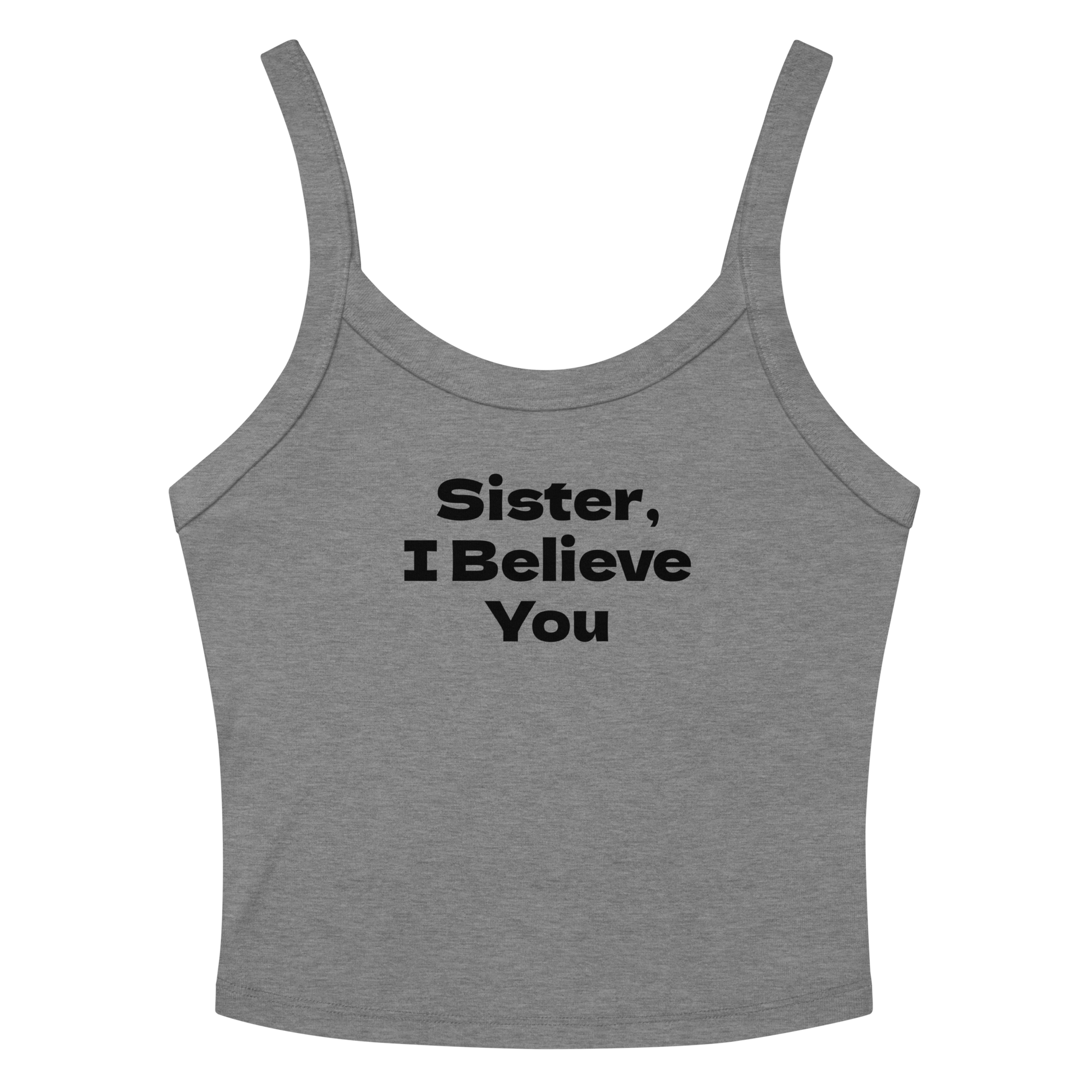 "Sister, I Believe You!" printed on a athletic heather women's micro-rib tanktop laying on a flat surface amongst sunglasses and shorts