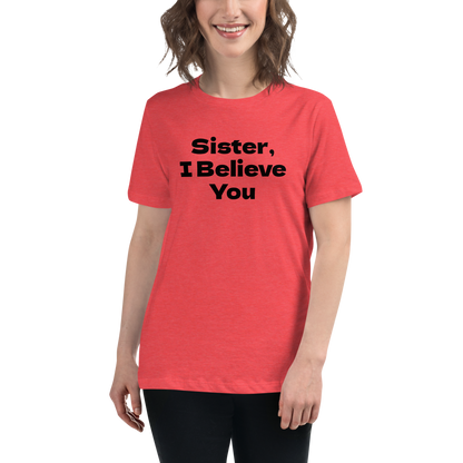 "Sister, I Believe You!" printed on a heather red women's relaxed t-shirt worn by a female